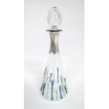 A Sileda glass scent / perfume bottle with silver collar hallmarked London 1988. Approx 5 3/4"