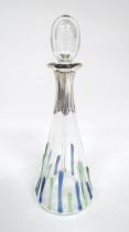 A Sileda glass scent / perfume bottle with silver collar hallmarked London 1988. Approx 5 3/4"