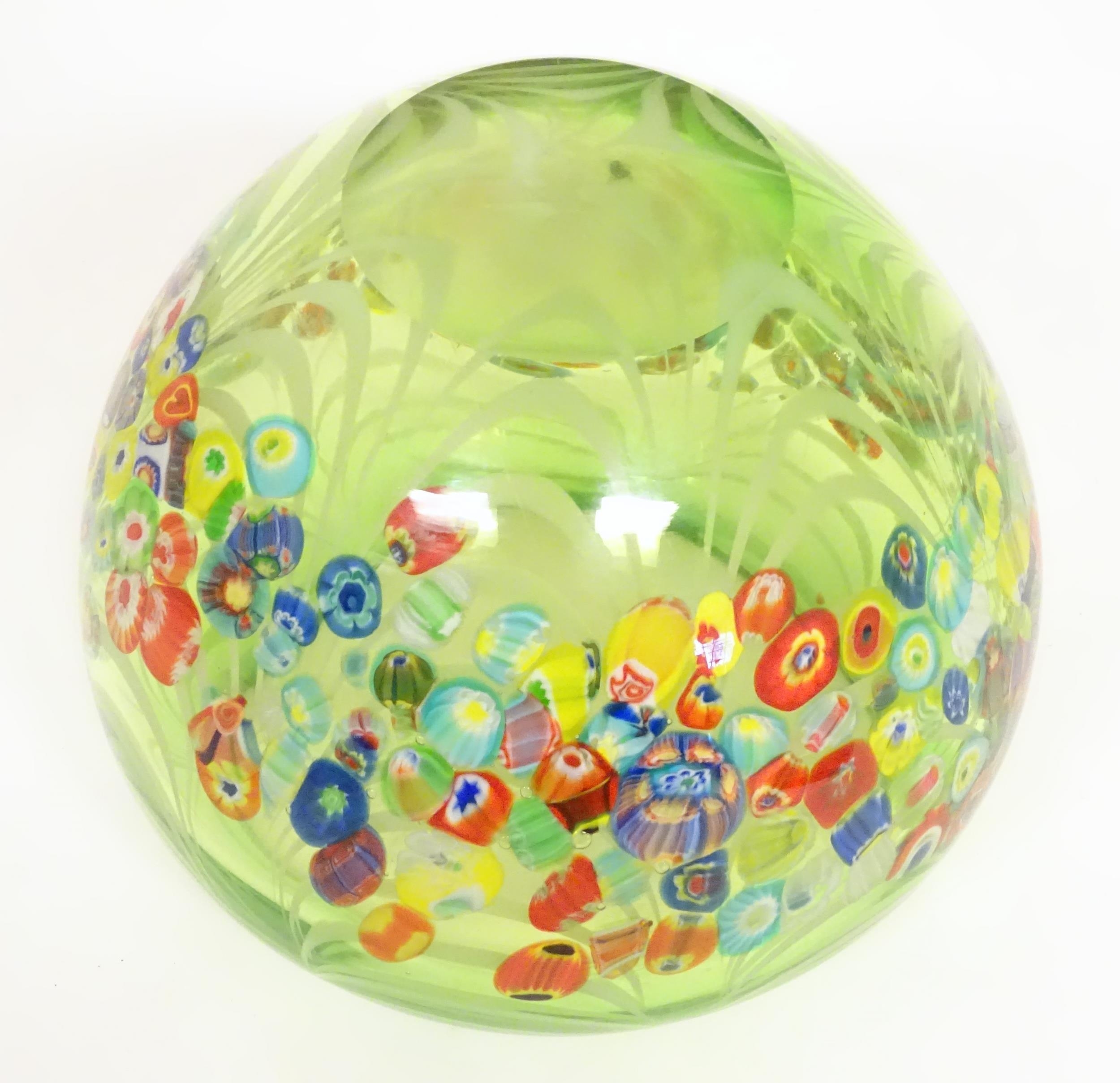 A green glass bowl with millefiori style decoration. Approx 7 1/2" high x 9" wide Please Note - we - Image 6 of 6