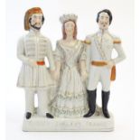 A Victorian Staffordshire pottery flat back figural group Turkey, England, France, depicting