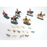 Toys: 20thC painted lead hunting figures comprising six figures on horseback, and 13 gun dogs /