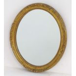 A 20thC giltwood and gesso mirror. 12" wide x 14" high. Please Note - we do not make reference to