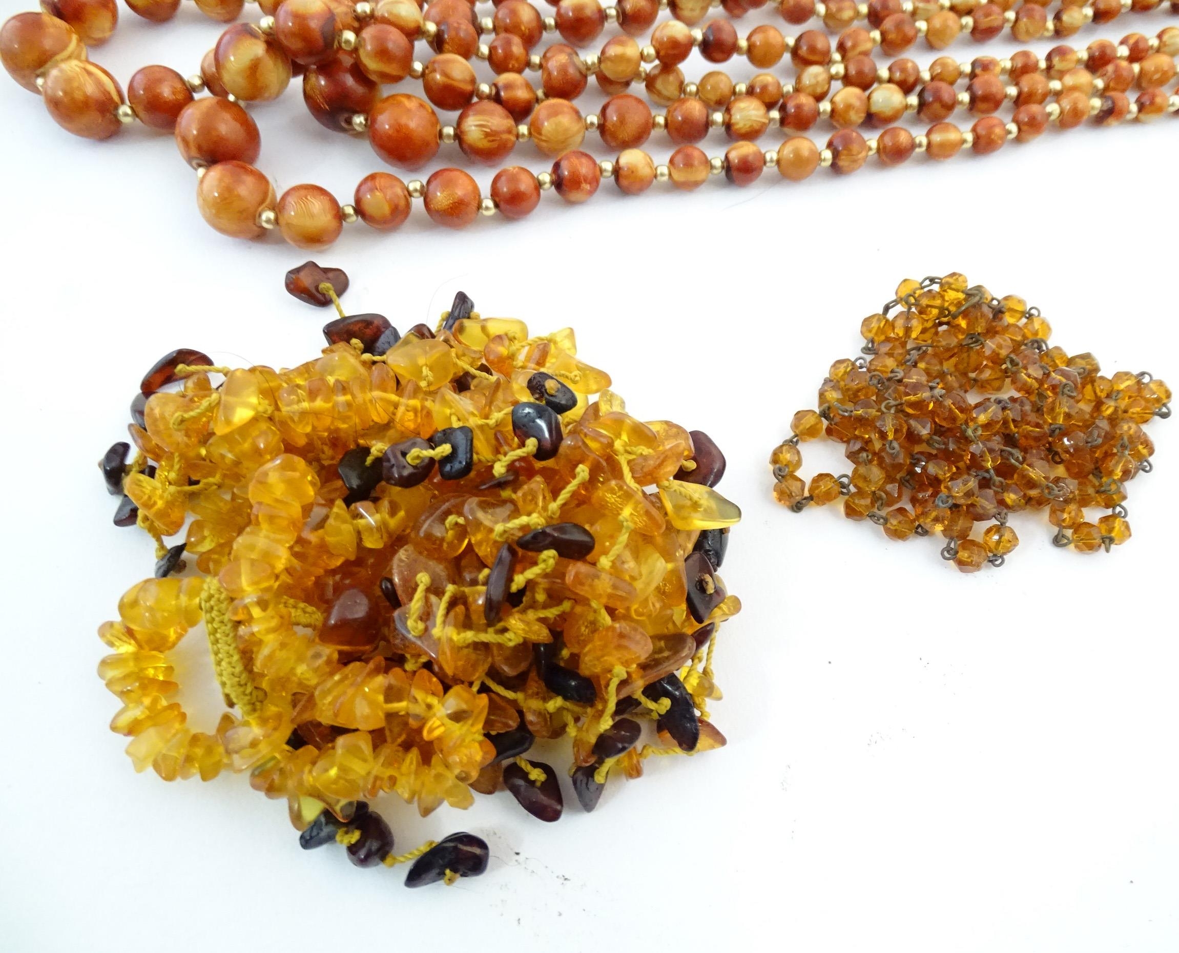 A quantity of assorted bead necklaces to include some amber examples. Please Note - we do not make - Bild 4 aus 16