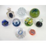 A quantity of assorted paperweights to include examples by Mdina, Maude & Bob St Clair etc (9)