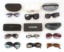 Vintage fashion: a quantity of assorted sunglasses, some with cases (9) Please Note - we do not make