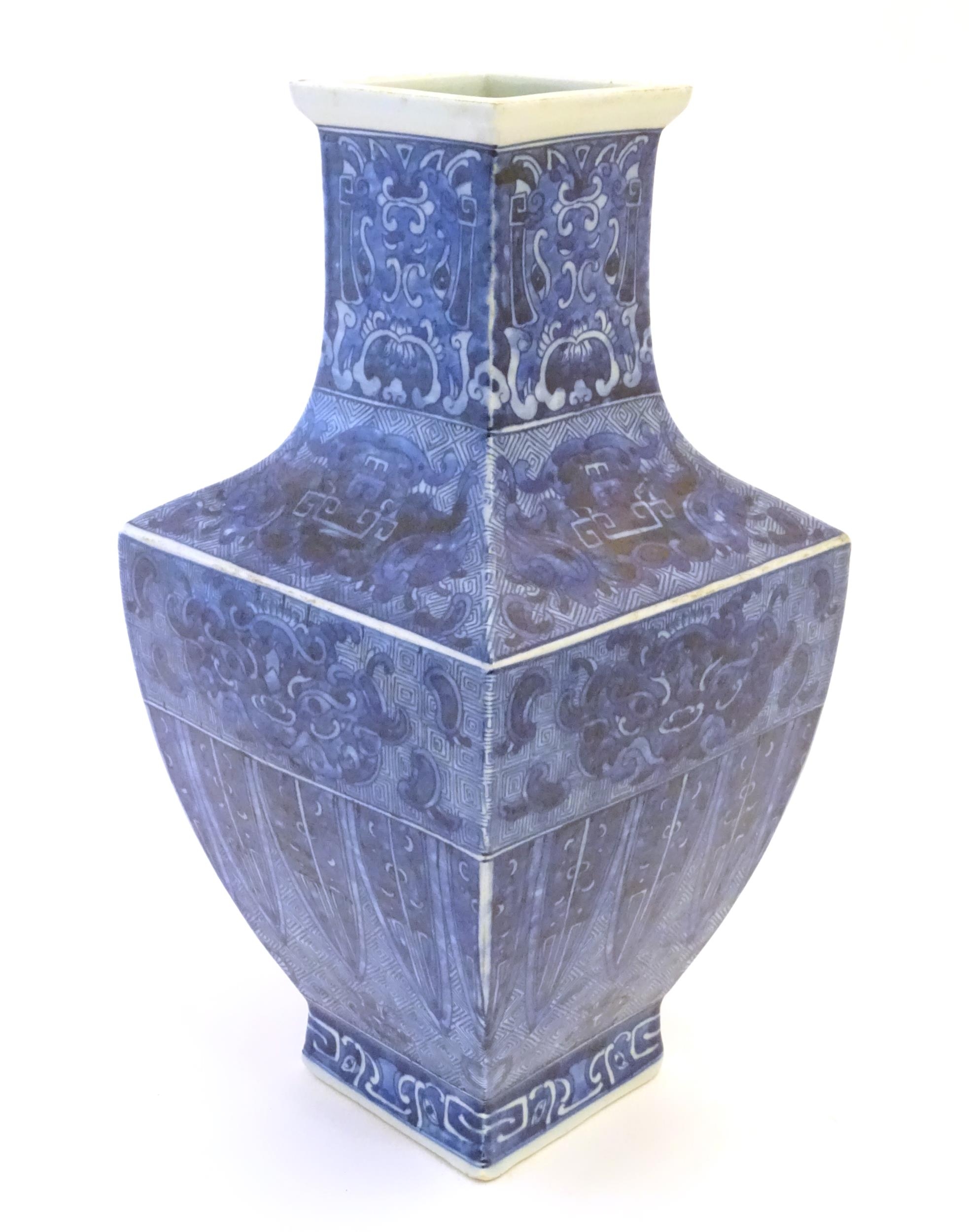 A Chinese blue and white vase of squared form decorated with stylised masks, banded detail and - Image 3 of 7