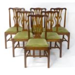 A set of six late 19thC / early 20thC mahogany Chippendale style chairs with shaped top rails and