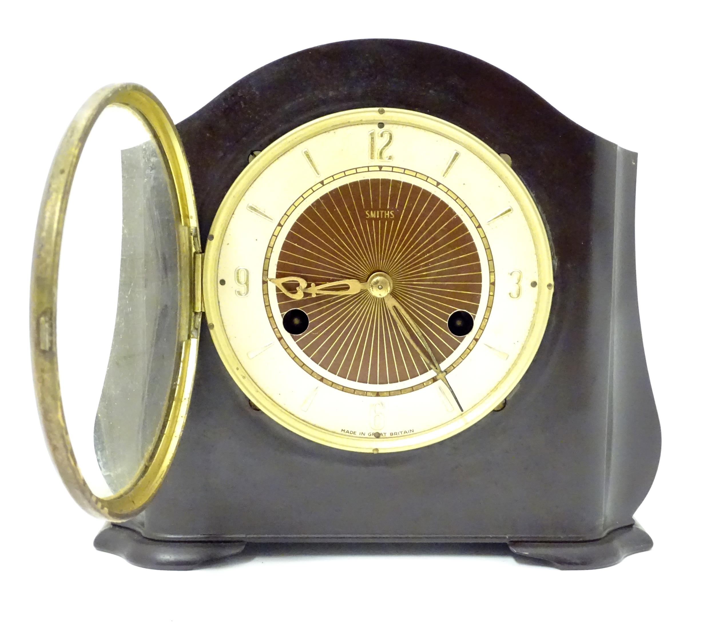 A Bakelite cased mantel clock by Smiths. 7 1/4" high Please Note - we do not make reference to the - Image 9 of 13