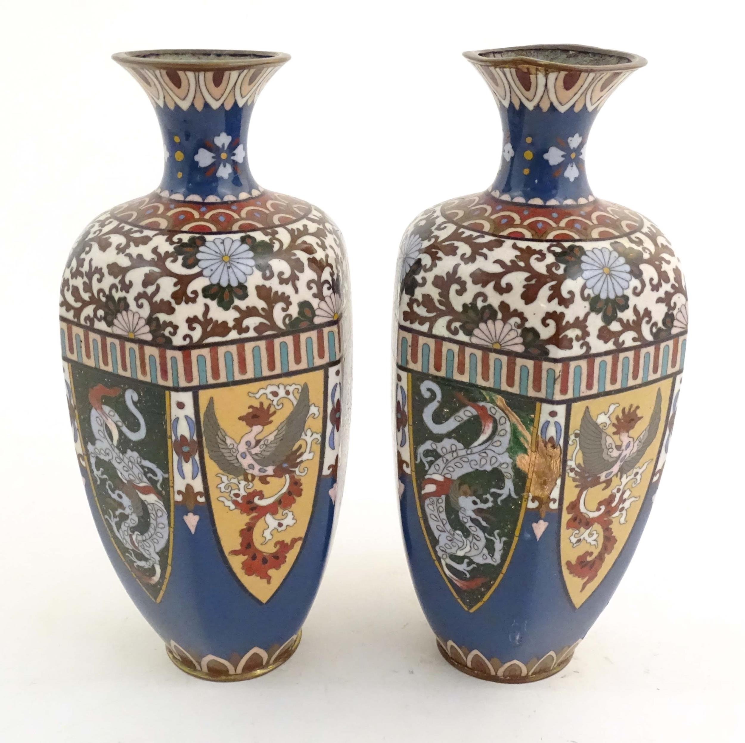 A pair of Oriental cloisonne vases decorated with panels of dragons and phoenix birds, the shoulders - Image 6 of 7