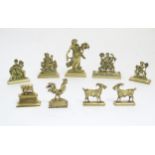 A quantity of assorted cast brass fireplace / fireside / chimney ornaments to include a Classical