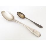 A Geo III silver Fiddle pattern teaspoon hallmarked London 1810, maker S. A. Together with a