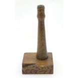 A 20thC wooden lamp base section modelled as a lighthouse with a stepped base. Approx. 12 3/4"