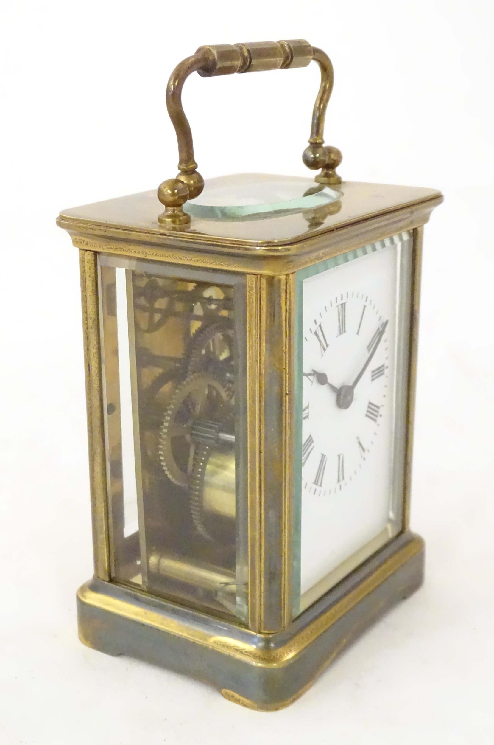 A carriage clock with white enamel dial. 5 3/4" high 'overall. Please Note - we do not make - Image 2 of 6