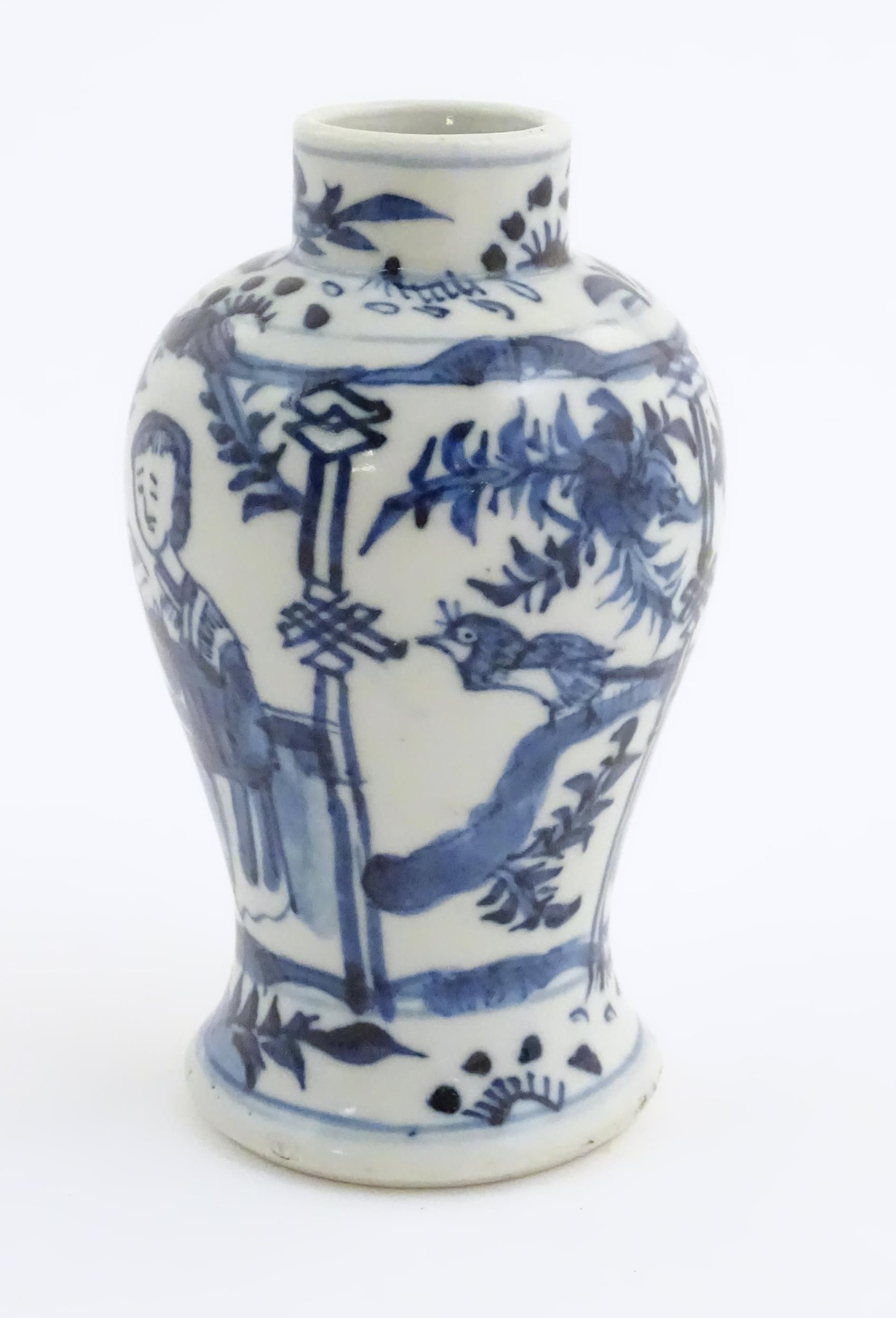 A small Chinese blue and white vase decorated with figures on a garden terrace with flowers and - Image 3 of 7