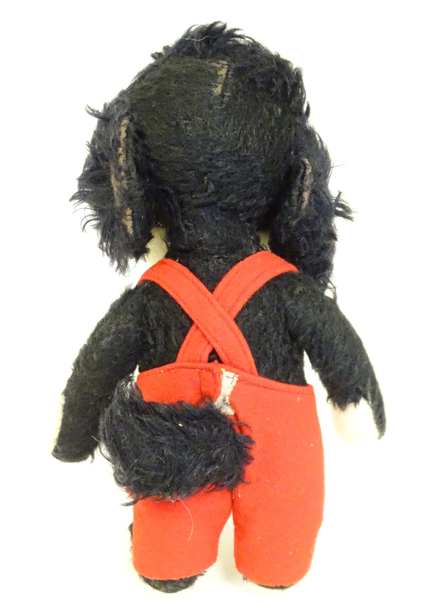 Toy: A mid 20thC Merrythought Mr Twisty stuffed toy dog, bearing label under. Approx. 11" high - Image 6 of 7