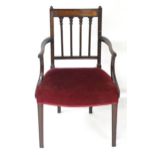 A late 18thC mahogany Adam designed open armchair with fluted supports, reeded back splats formed as
