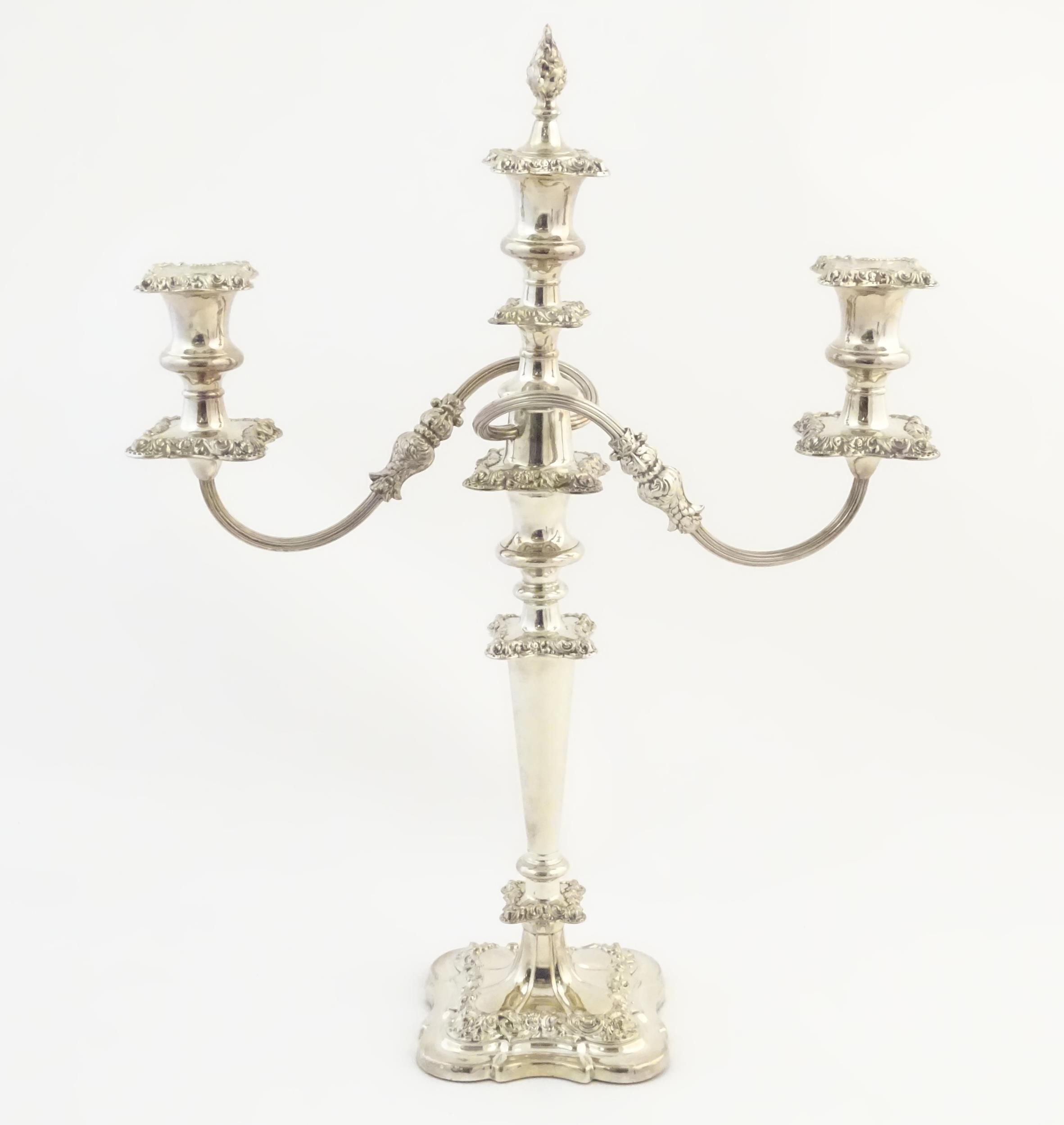 A silver plate table candelabra with two scrolling branches and acanthus scroll detail. Approx 21" - Image 3 of 8