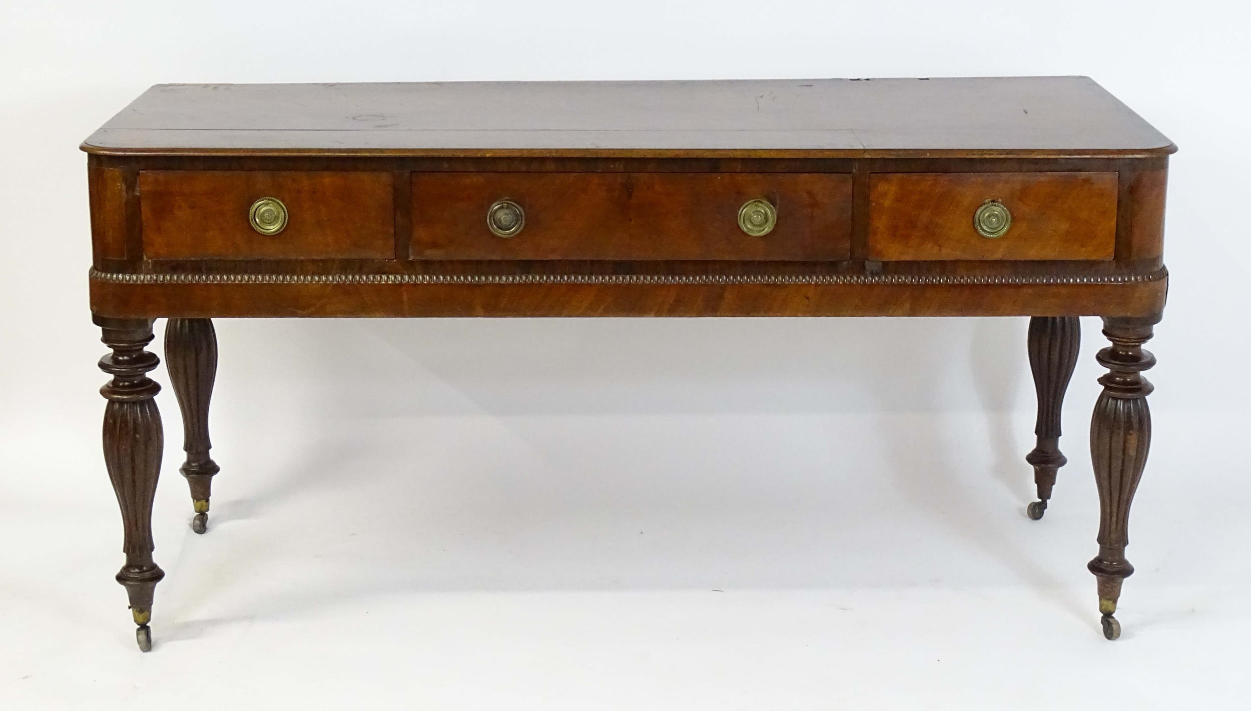 A 19thC mahogany sideboard with a moulded top above one long drawer and two short drawers with - Image 4 of 8