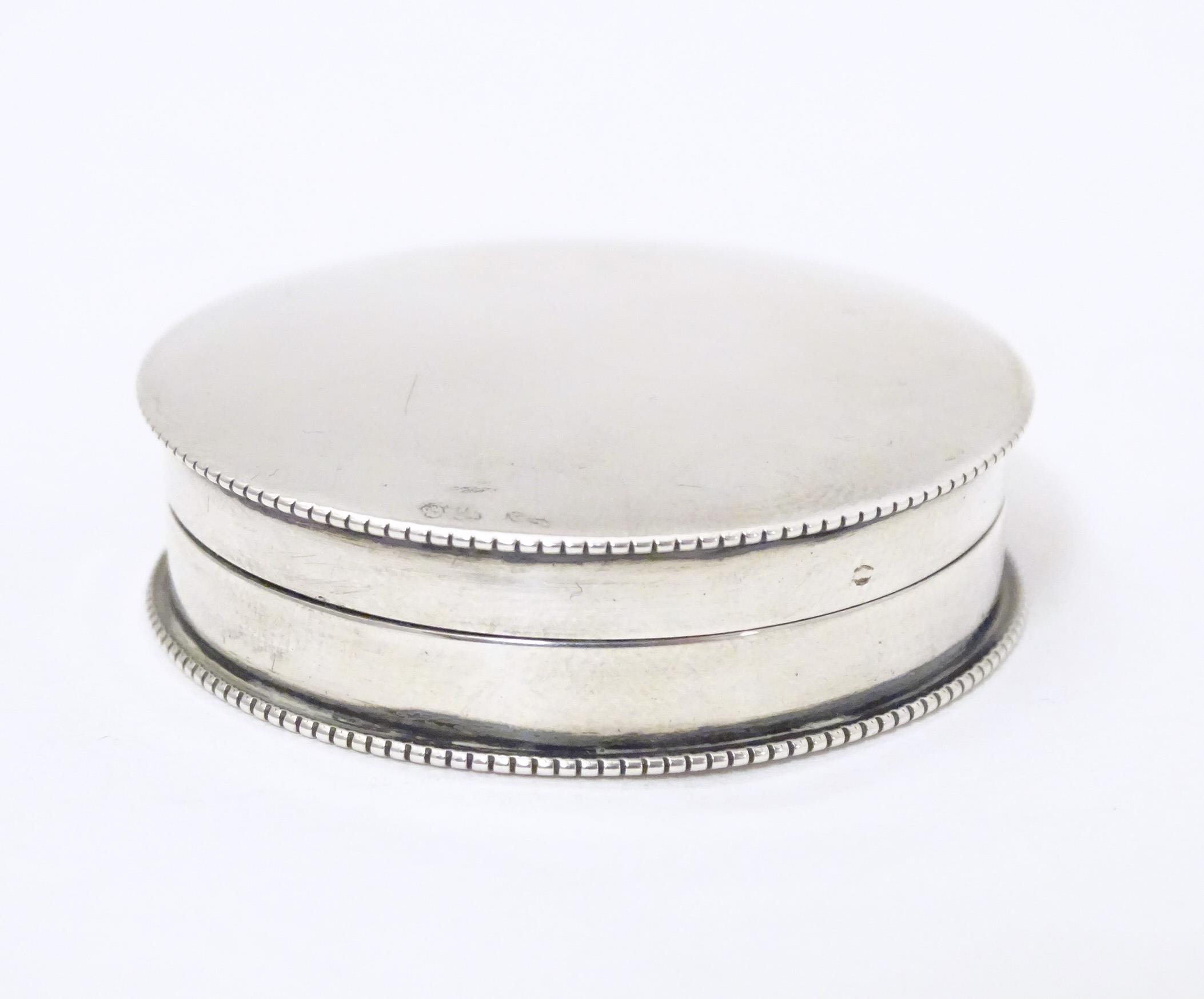 A Victorian silver pill box of circular form with gilded interior, hallmarked Birmingham 1897, maker - Image 3 of 6