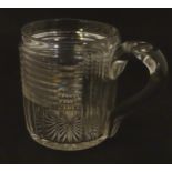 An early 19thC cut glass tankard 4 1/2" high Please Note - we do not make reference to the condition
