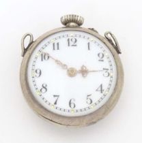 A late 19thC / early 20thC small bulls eye style pocket watch with glazed front and back with