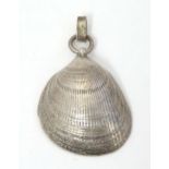 A silver pendant of shell form, hallmarked London 1988. Approx. 2 1/4" long Please Note - we do