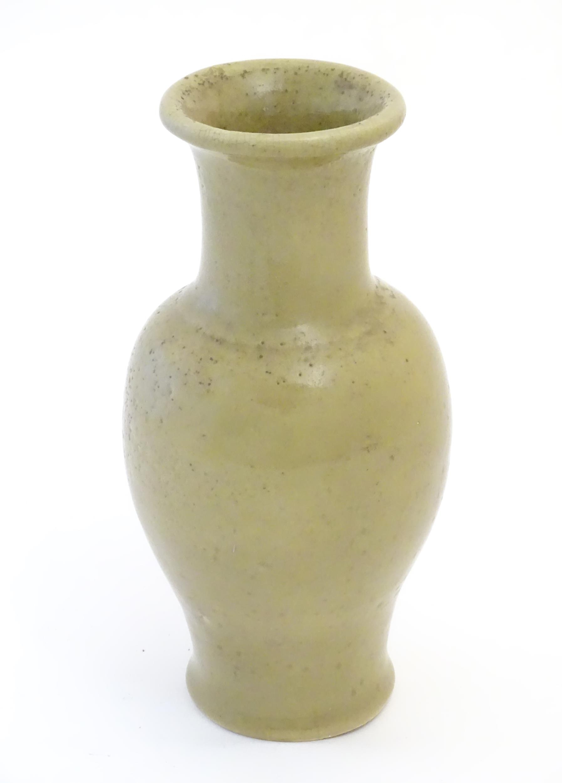 A Chinese stoneware baluster vase with a crackle glaze. Approx. 13 1/2" high Please Note - we do not