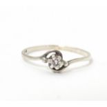 A diamond solitaire ring in a platinum setting. Ring size approx. O Please Note - we do not make