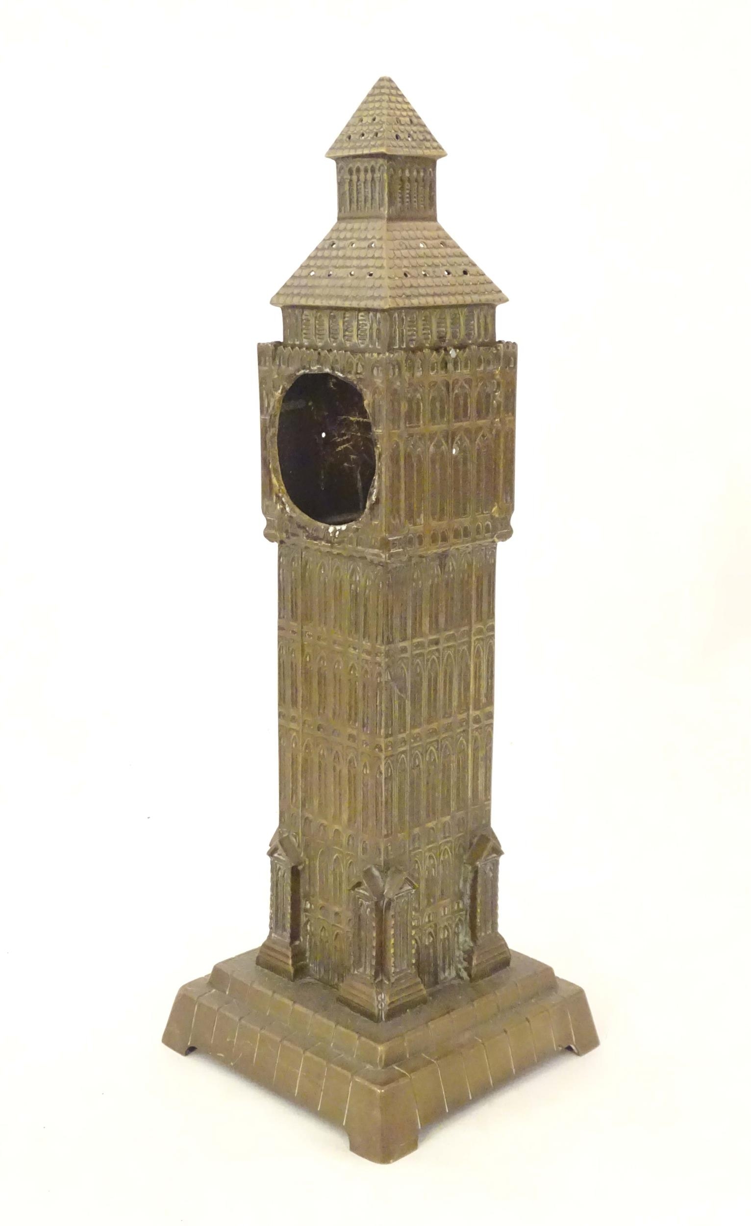 A cast brass clock case formed as Big Ben. Approx. 21 1/2" high Please Note - we do not make