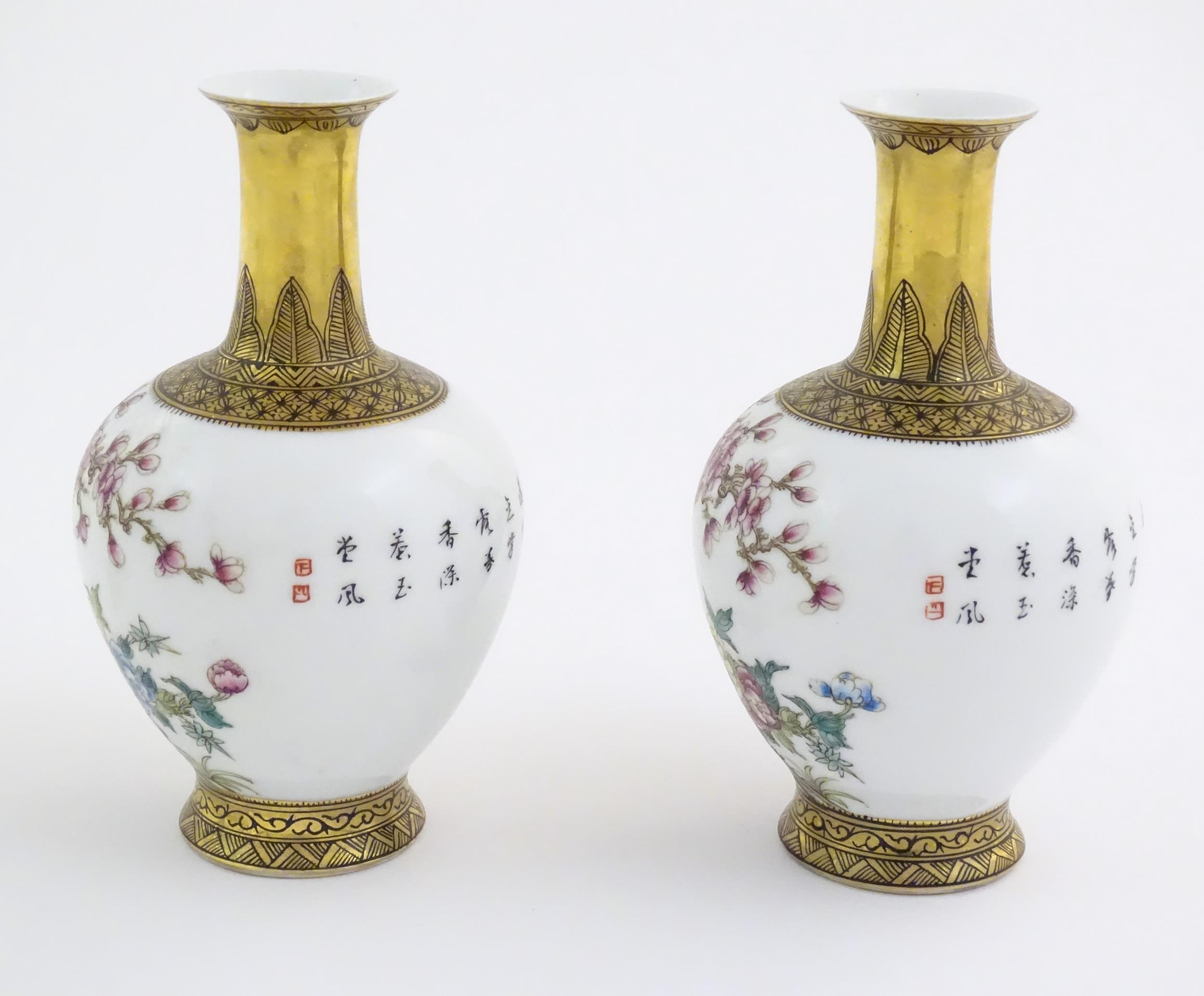 A pair of Chinese vases decorated with birds, flowers and blossom trees, with gilt detail to necks - Bild 11 aus 11