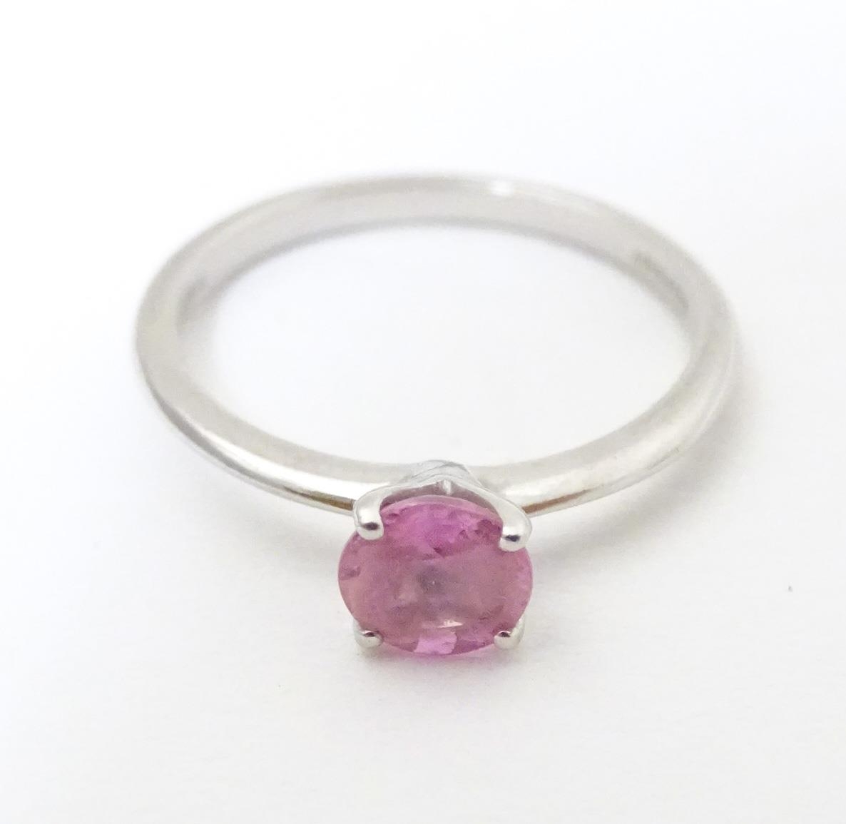 A platinum ring set with pink sapphire solitaire. Ring size approx. O Please Note - we do not make - Image 3 of 7