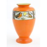 An Art Deco Bursley Ware vase of baluster form with banded decoration depicting a winter landscape