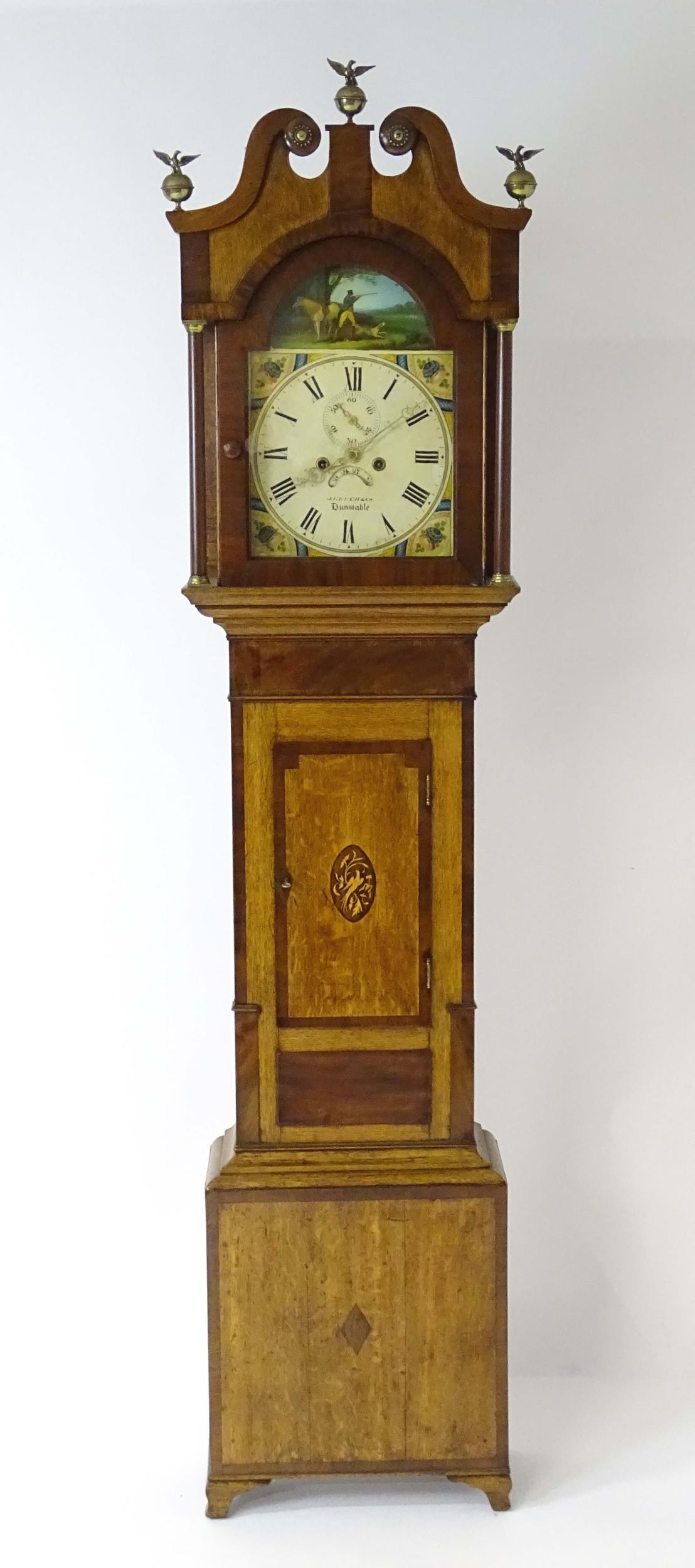 A 19thC 8-day long case clock, the break arch painted dial signed J Keech & Co. (Reech) Dunstable (