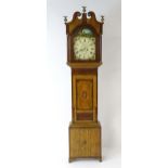 A 19thC 8-day long case clock, the break arch painted dial signed J Keech & Co. (Reech) Dunstable (