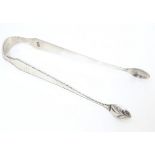 19thC silver sugar tongs with bright cut decoration, maker W. C. Approx. 5 1/2" long Please Note -