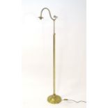 A 20thC brass standard lamp of adjustable height. Approx 75" high (fully extended) Please Note -