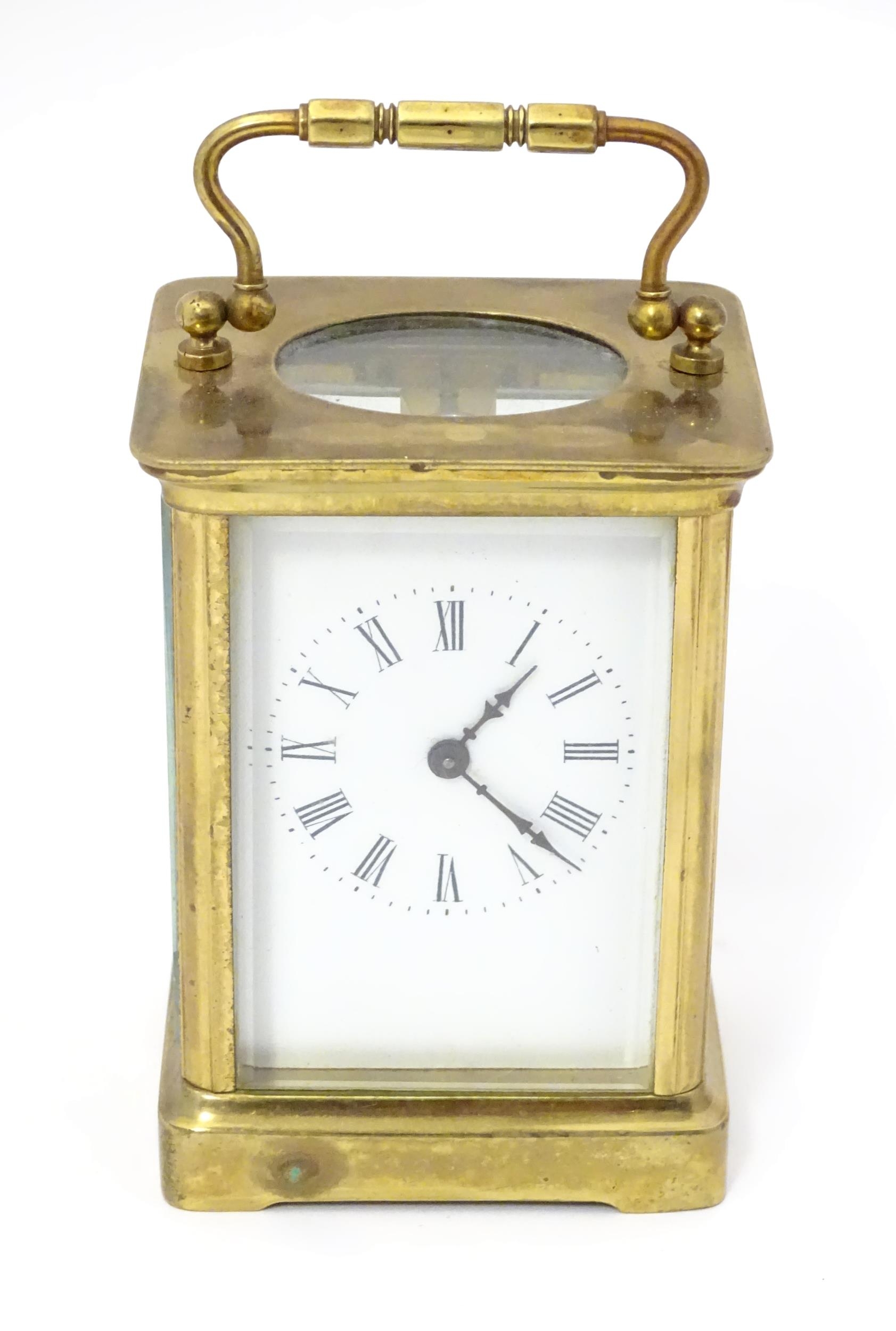 A carriage clock with brass case and enamel dial. Approx. 5 1/2" high overall. Please Note - we do - Image 13 of 13