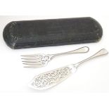 A cased pair of silver plate Old English pattern fish servers, cased. Case approx. 14 1/2" long
