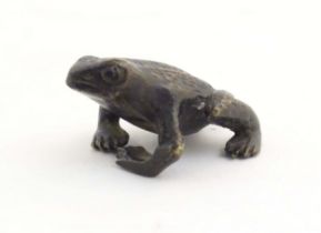A cold painted bronze model of a frog / toad. Approx. 2" long Please Note - we do not make reference