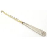 A silver handled button hook hallmarked Birmingham 1916 maker Henry Clifford Davis 5" long