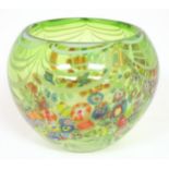 A green glass bowl with millefiori style decoration. Approx 7 1/2" high x 9" wide Please Note - we