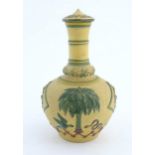 A 19thC lidded bottle vase with relief and polychrome decoration depicting the coat of arms of the