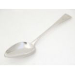 A George III silver Old English pattern table spoon, hallmarked London 1811, maker John Lambe.