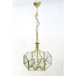 A late 20thC pendant light with 6 central branches, The whole surrounded by 6 etched glass panels.