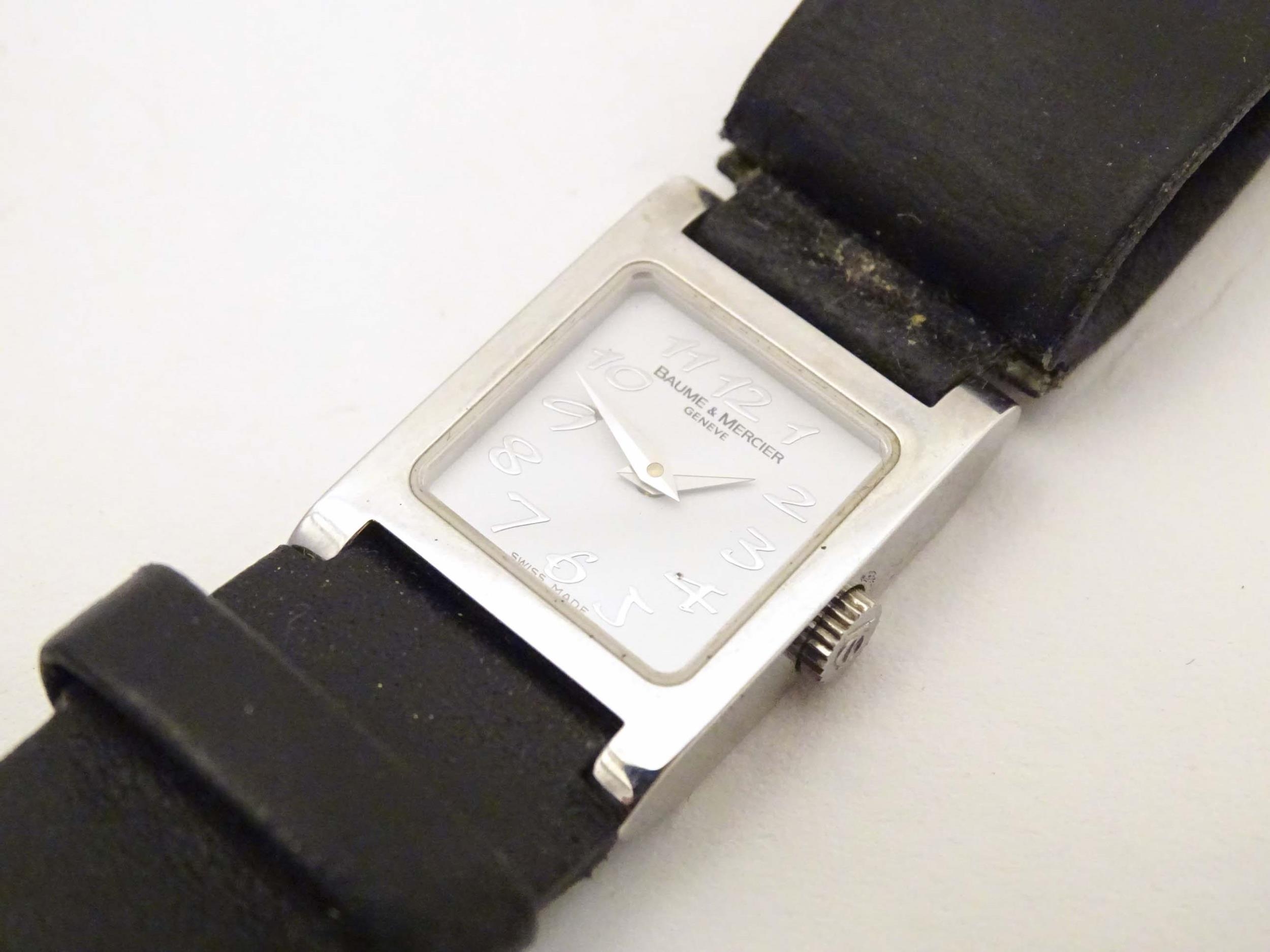 A Baume & Mercier Vice Versa quartz wrist watch, the case signed and numbered having a black leather - Image 11 of 12