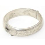 A silver bangle formed bracelet hallmarked Birmingham 1959 maker E Lilley & Co Please Note - we do