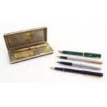 A mid to late 20thC presentation cased Win International lighter and ballpoint pen set, together