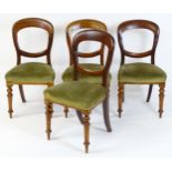 A set of four 19thC mahogany balloon back chairs, having sprung seats above turned tapering front