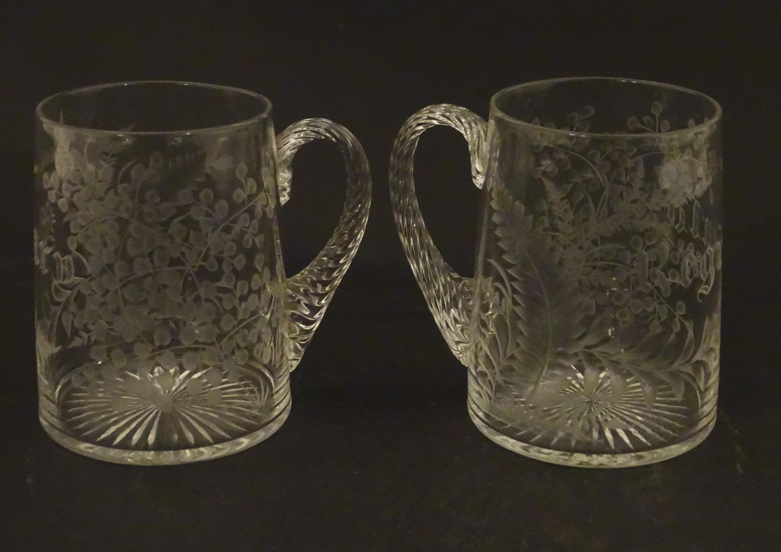 Two 19thC glass tankards with twist handles and engraved foliate decoration. One titled 'Mary', - Image 3 of 9