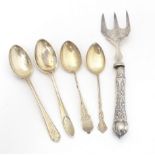 Four assorted silver teaspoons, together with a silver handled fork. Largest approx. 6 1/2" long (5)